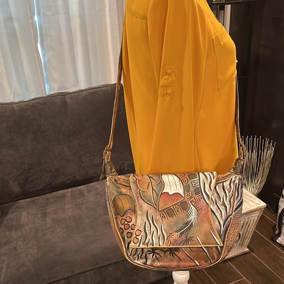 Sova Hand-painted Leather Crossbody. Never  used. Earth tone with silver accent - Picture 4 of 15